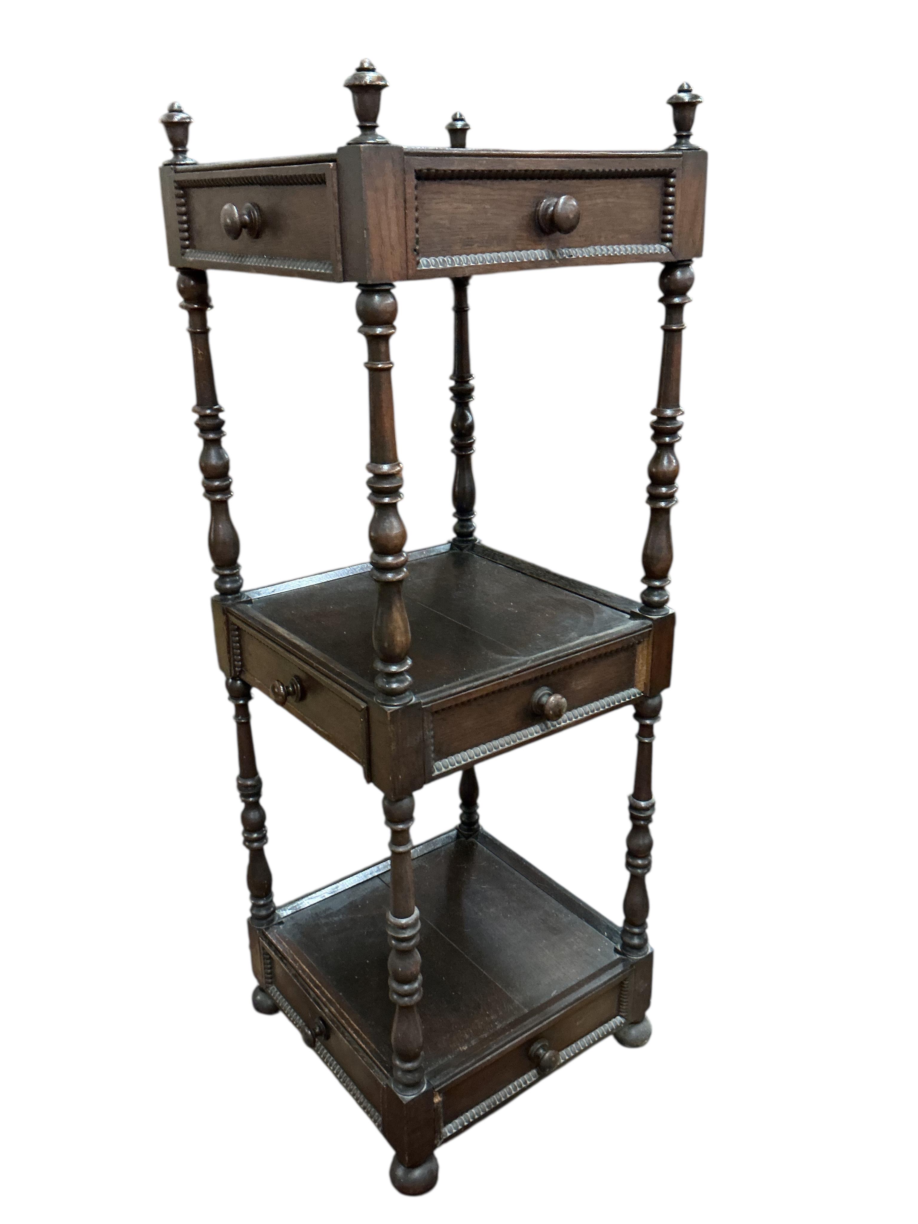 A Regency style oak three tier whatnot, width 46cm, height 136cm
